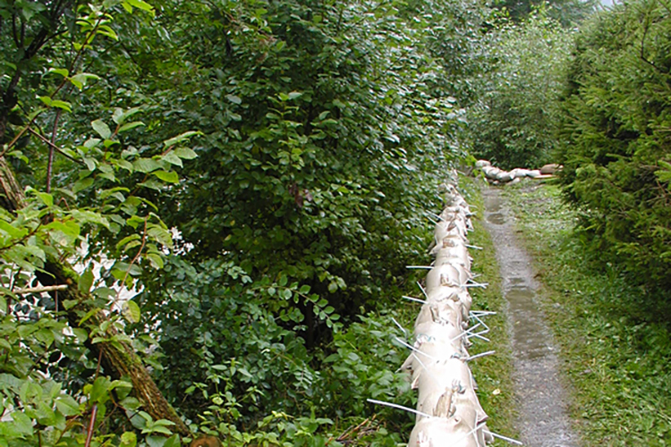 Sandsäcke entlang der Steinacher Achen während des Hochwassers im August 2005 Sandsäcke entlang der Steinacher Achen während des Hochwassers im August 2005